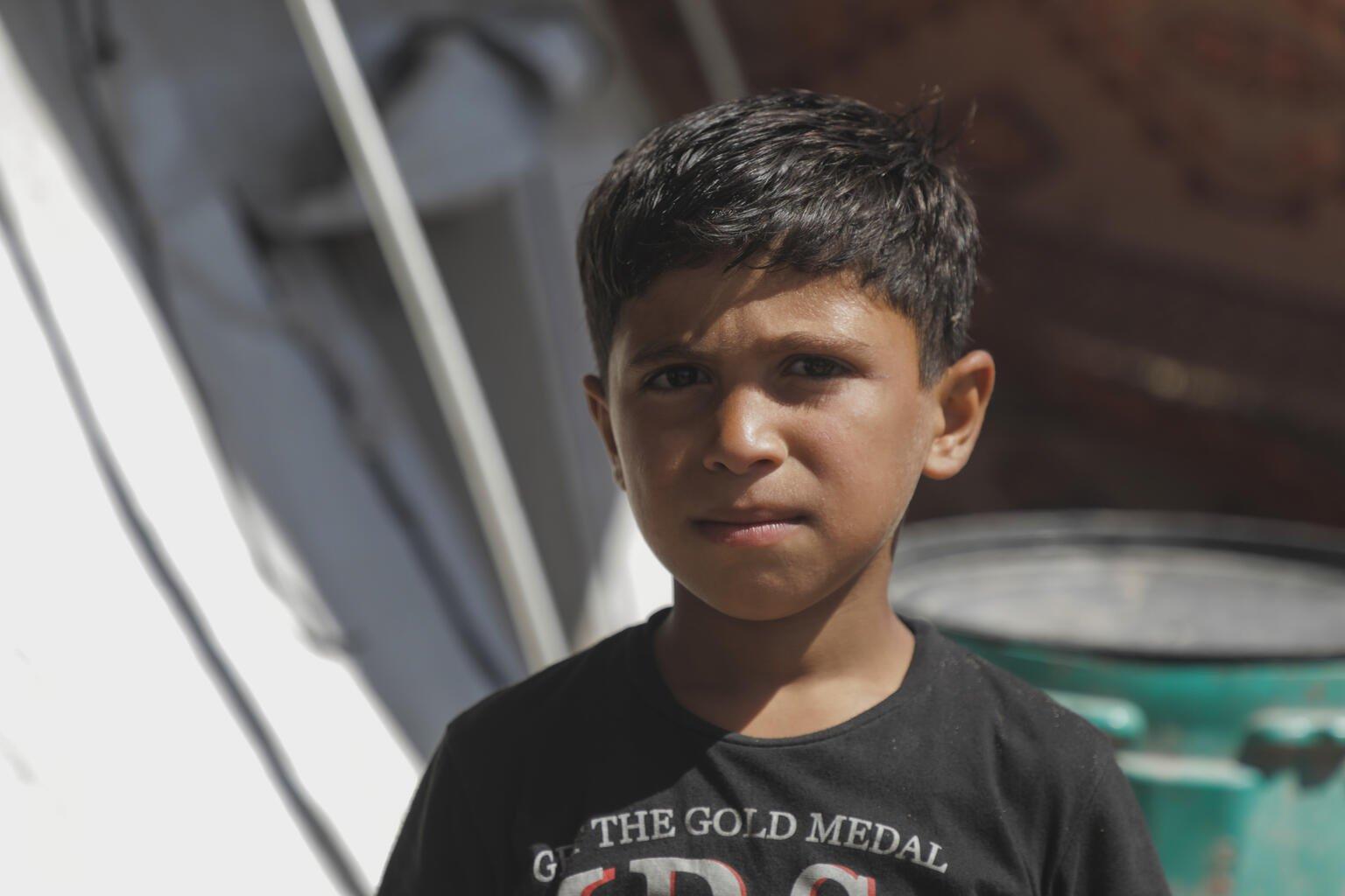 Ayman (7) in de haven van Gaza