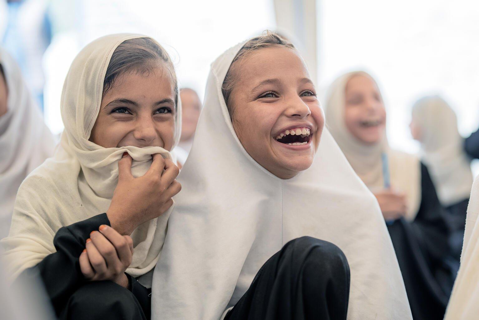 Lachende kinderen in Afghanistan
